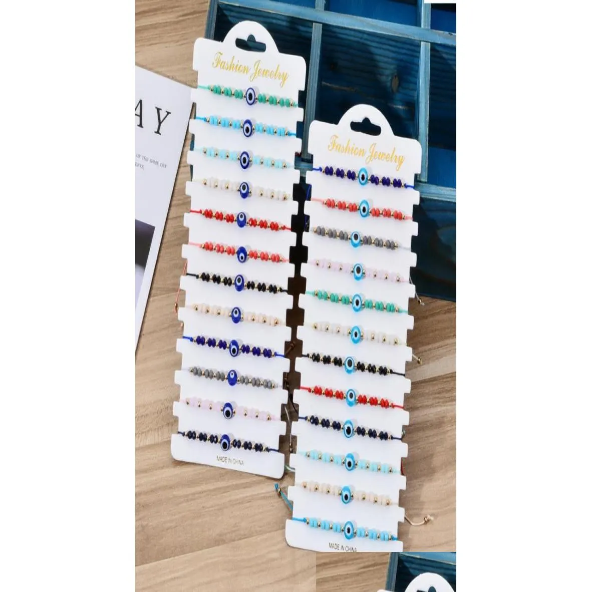 Bracelets de charme 12pcsset Turquie Bleu Evil Eye Bracelet Femmes Corde À La Main Chaîne Perles De Cristal Fille Bijoux De Fête Cadeau 6164091 Drop Del Dhx5U