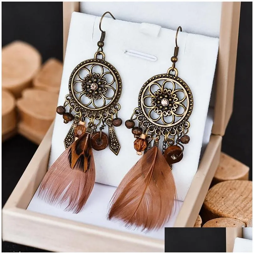 Dangle Lustre Vintage Plume Boucles D'oreilles Déclaration Ronde Fleur Creuse Perles De Bois Bohème Ethnique Gland Boucles D'oreilles Dangle Drop Livrer Dhotb