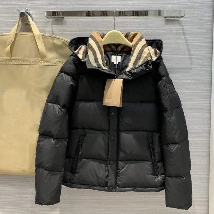 Piumino da uomo Designer Giacche di cotone con cappuccio Abbigliamento impermeabile Piumini Parka Giacca a vento di lusso Zip Cappotto da donna Lettera Burbrerys Gilet Outwear Cappotti tecnici