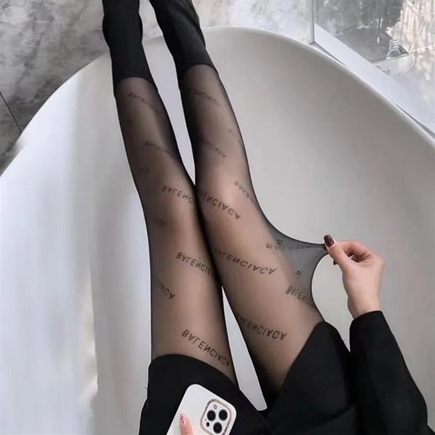 Net red Paris home's same letter black silk stockings can be cut at will pineapple cat claw stockings anti wolf stockings fis283H