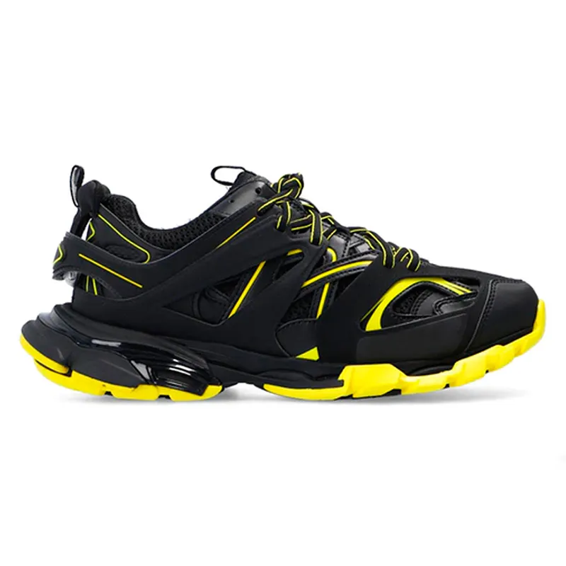 Black and yellow track shoes top
