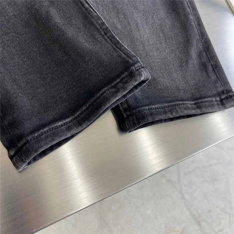 Jeans da uomo firmati 23 nuovi jeans da uomo piccoli dritti casual triangolo etichetta nastro ricamato lettera denim pantaloni LO7J