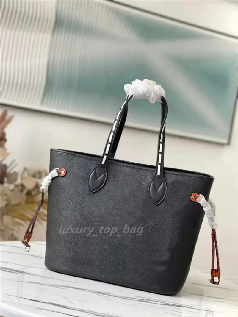 Top Designer Classic Bag Tout le matériel en acier Sac à main imprimé léopard Sac fourre-tout de luxe pour femmes Sac fourre-tout imprimé alphabet de grande capacité Sacs de mode