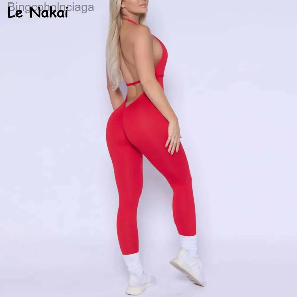 Actieve sets Nieuw Halter Scrunch Butt Jumpsuit voor dames Gevoerd sportpak Workout trainingspak Gymkleding Rugloze trainingskleding NylonL231007