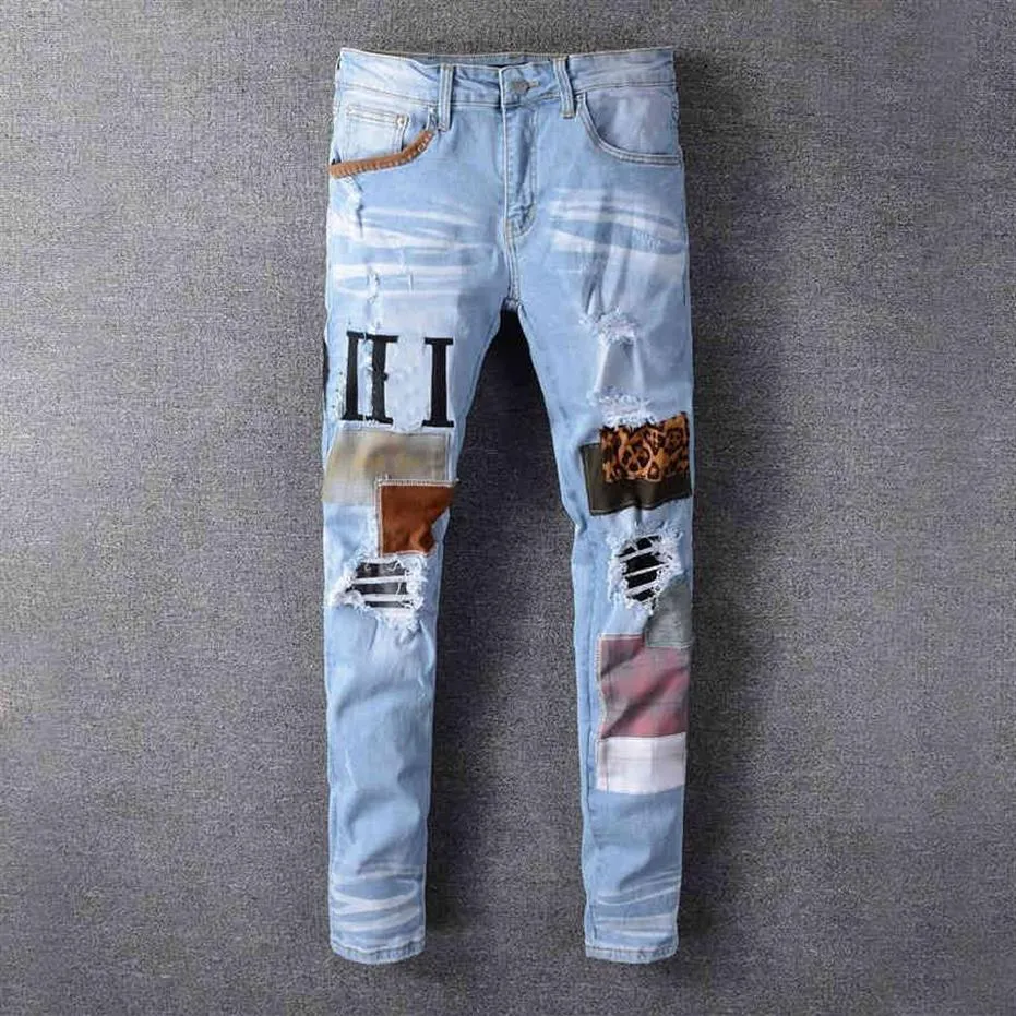 Pantaloni jeans classici da uomo pantaloni hip-hop stilista Jean pantaloni da motociclista strappati effetto consumato pantaloni denim da moto slim fit268N