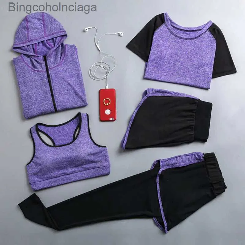 Set attivi Vendita calda da donna set da 5 pezzi ad asciugatura rapida giacca da yoga + maglietta + reggiseno + pantaloncini + pantaloni abbigliamento da palestra fitness set da corsa sportivo da donnaL231007