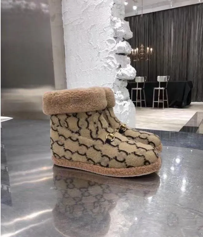 Botas de diseñador Cuero y piel australianos Botas de nieve integradas de alta calidad Tacón plano Confort Botas de mujer cálidas de felpa engrosadas Botas de tobillo de invierno 01