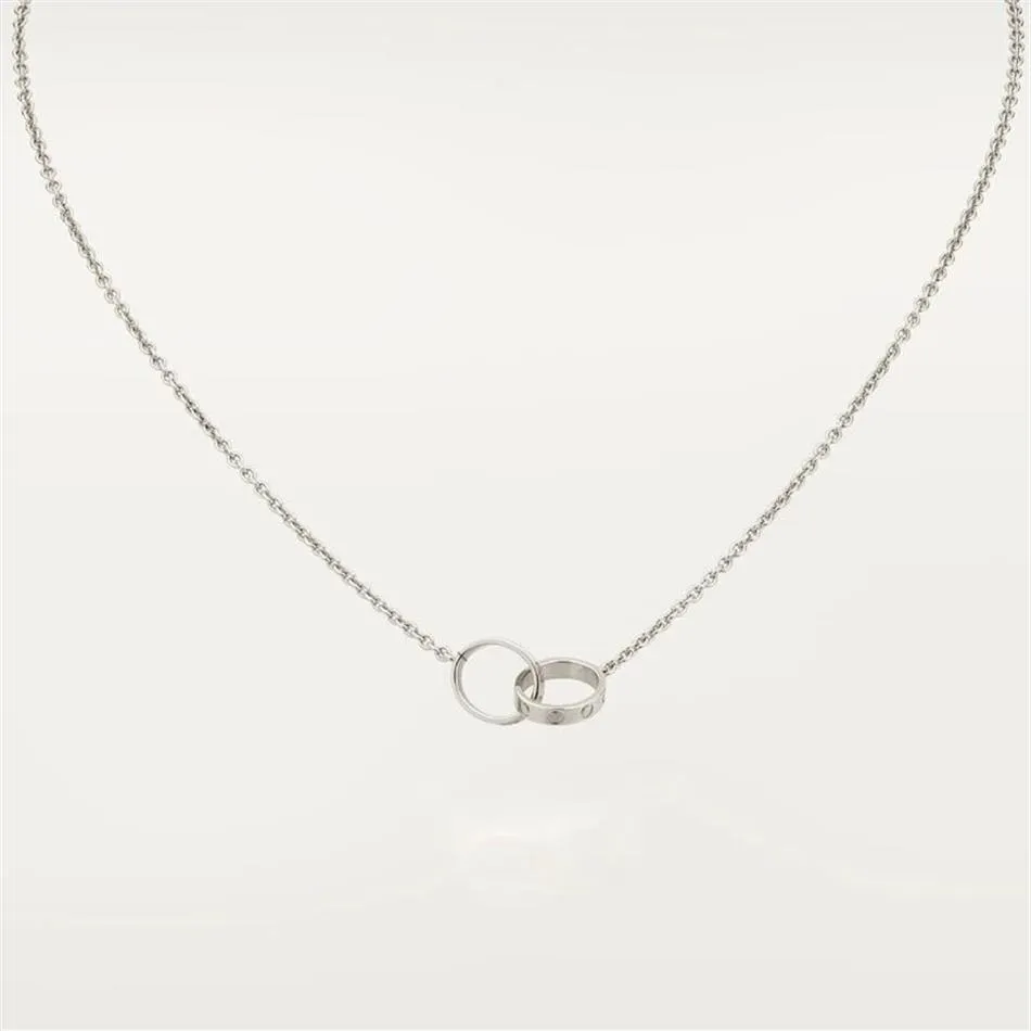 Nuovo design classico doppio anello charms pendente collana d'amore per le donne ragazze gioielli in acciaio al titanio 316L Collares Collier245R