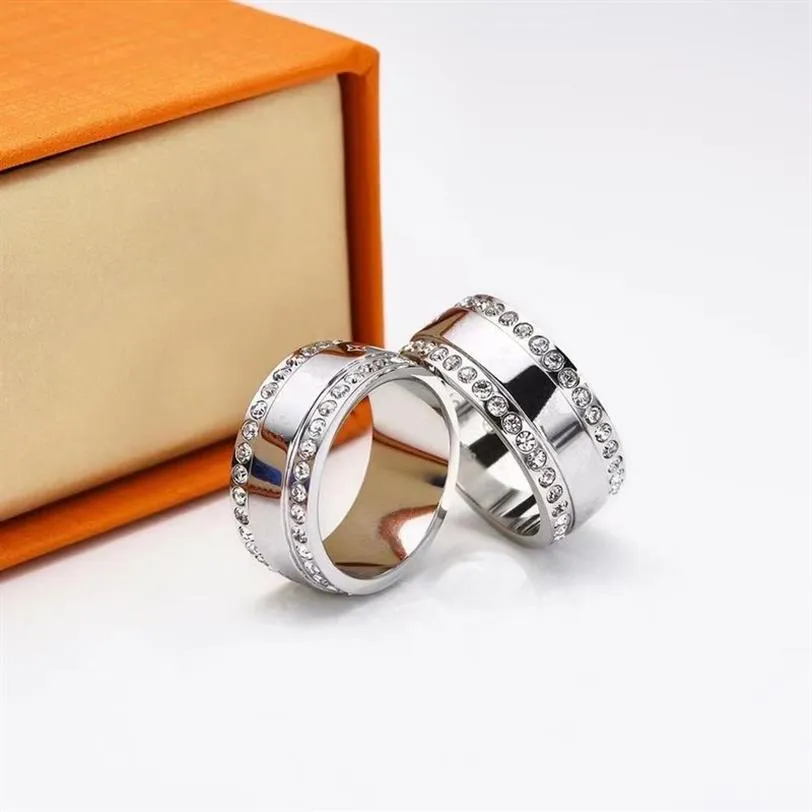 Novo estilo designer anel mens banda anéis de luxo jóias mulheres titânio liga de aço banhado a ouro artesanato prata nunca desaparecer não alérgico310x
