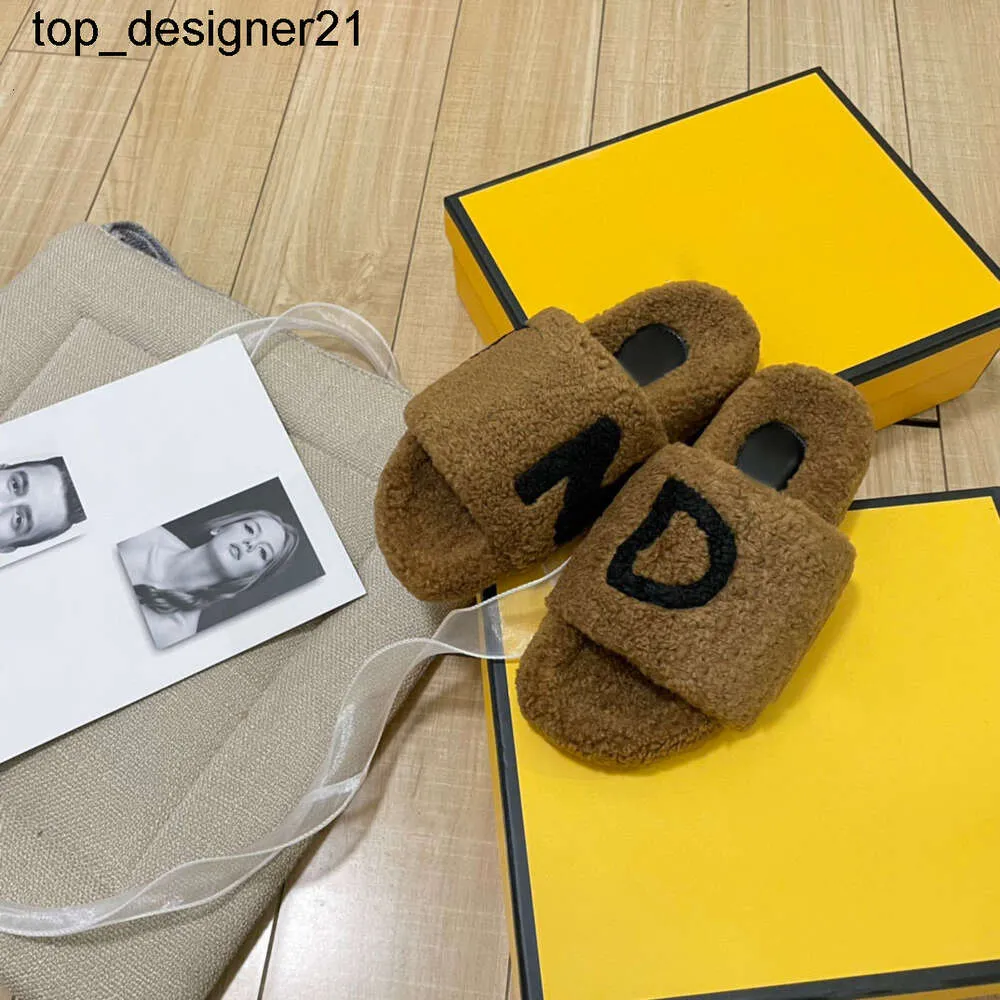 Nya 23SS -designers Sandaler Fend inomhus Sandal Ladies Luxurys Teddy Bear Shoes Baguette House Slippers Fashion Slides Populära Womens Fuzzy Tazz Slide