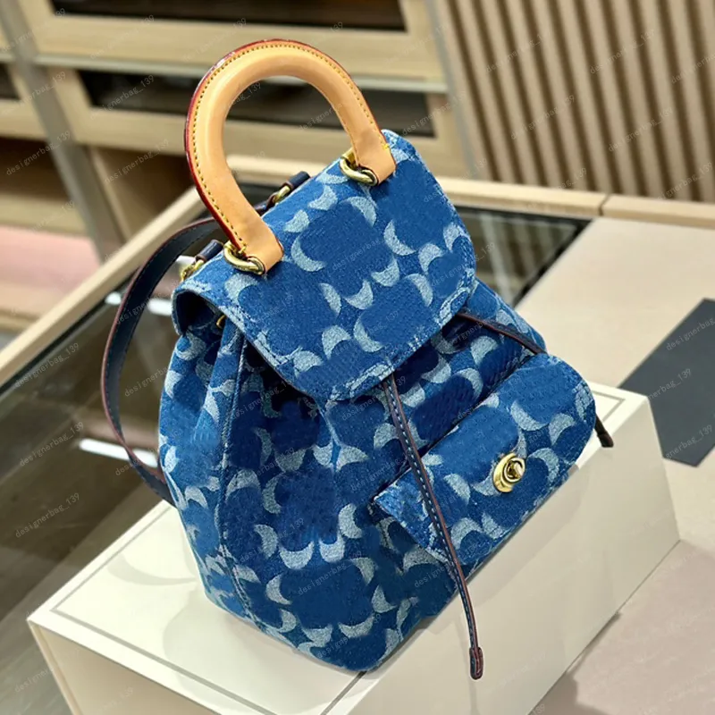 coach denim riya backpack 21 Riya 21 Signature Jacquard Small