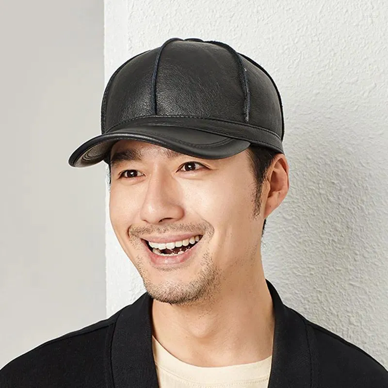 Leather baseball cap with fur ball on top sale
