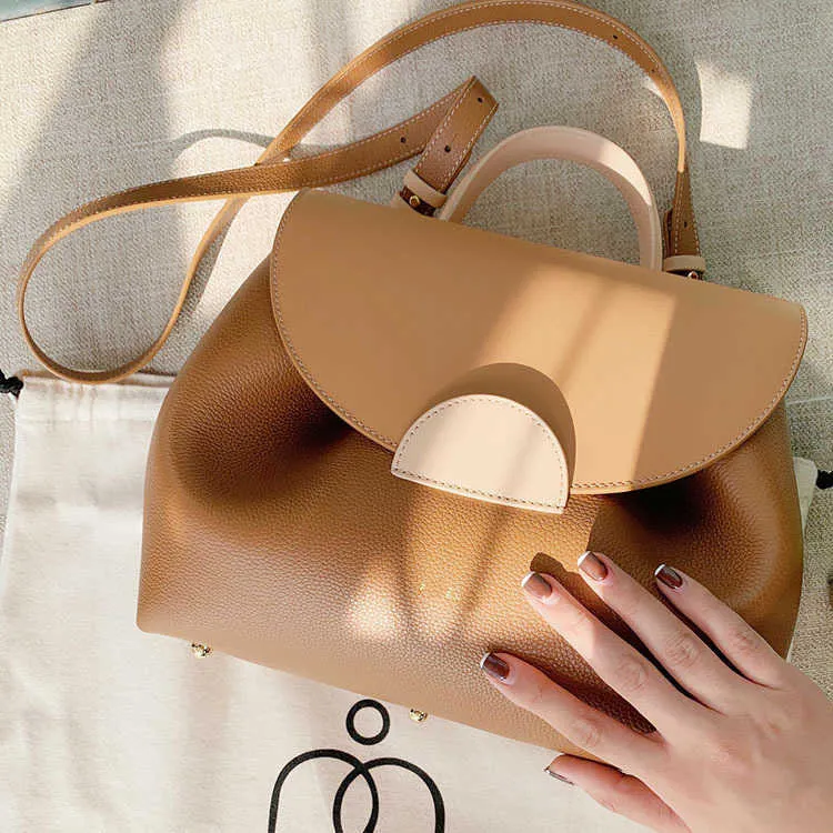 Französische Designertaschen Pole Shoulder Umhängetasche Damenhandtasche Echtes Leder Commuting Smiley Face Bag Tragbare kleine Tasche 231015