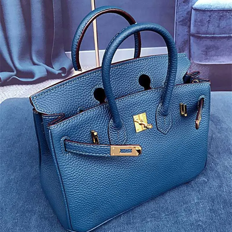 Sac à main de haute qualité, sac sensoriel en cuir véritable pour femme, sac à bandoulière portable, à la mode et simple, couche supérieure bleue en peau de vache