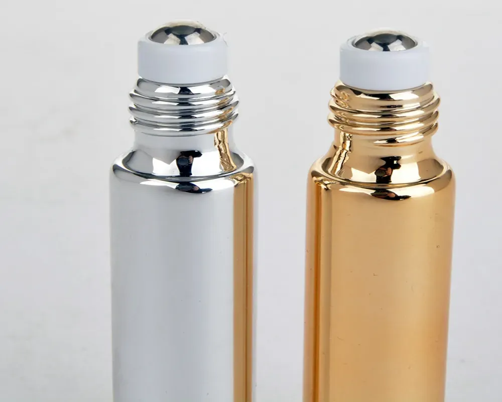 エッセンシャルオイル用の10mlメタルローラー補充可能ボトルUVロロンガラスボトルゴールドZZ