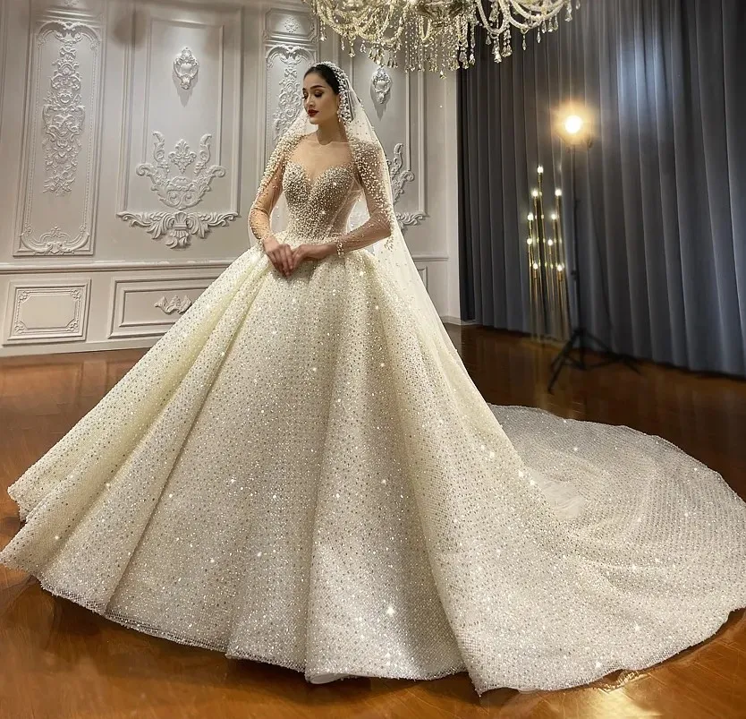 2024 Nuove donne abito da sposa Illusion Neck maniche lunghe Stunning Perline Perle Paillettes Abiti da sposa Robe Mariage Abiti da sposa Arabo Dubai