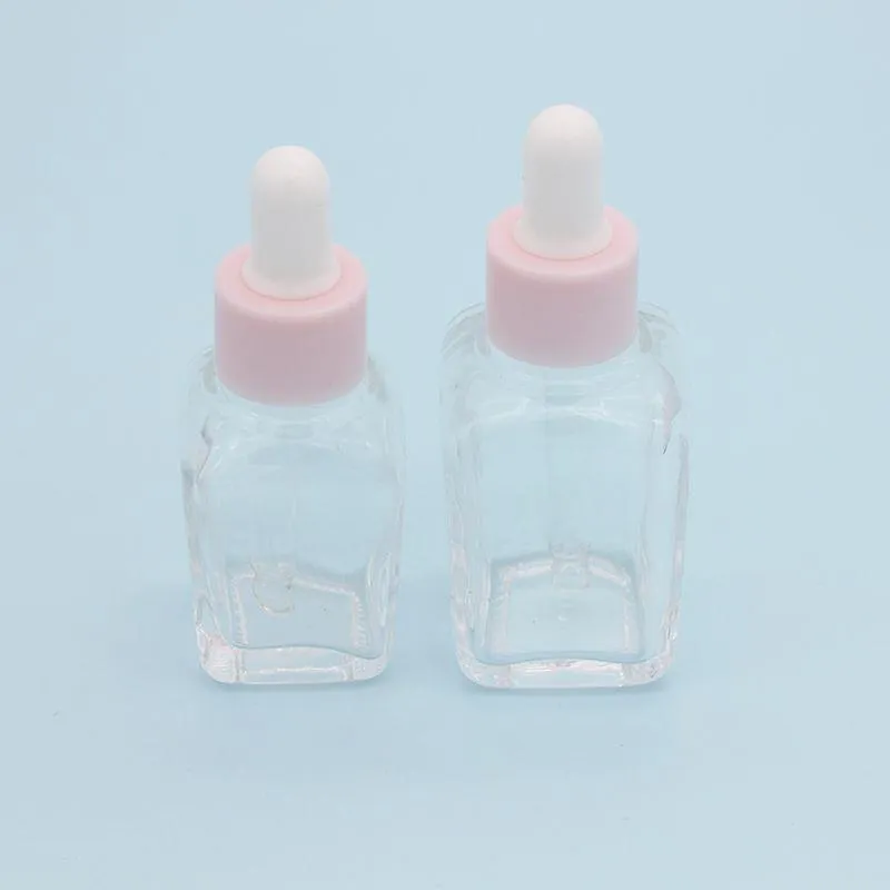 20 ml Essential Oil Square Droper Bottle 30 ml Clear Glass Serum -flaskor med rosa mössa för kosmetisk amjuv