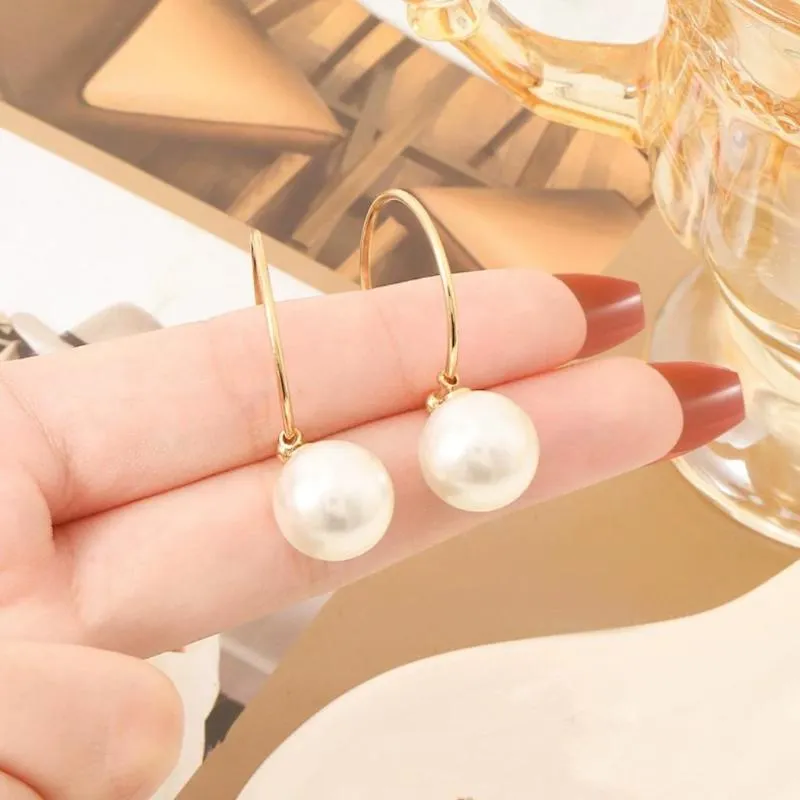 Ohrstecker, weiße, elegante Perle mit einer 2,5 cm großen Ohrringform.