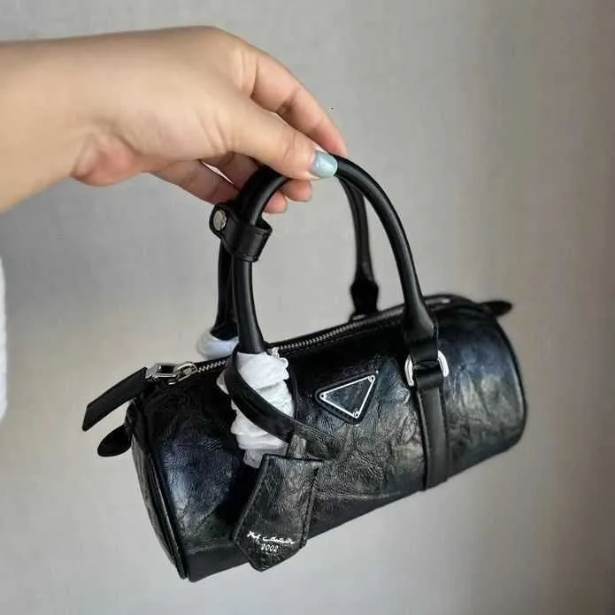 Autumn Nowy produkt skórzany ręczny cylinder moda Wysoka wersja na ramię Crossbody Damskie sklepy torebki są 95% zniżki