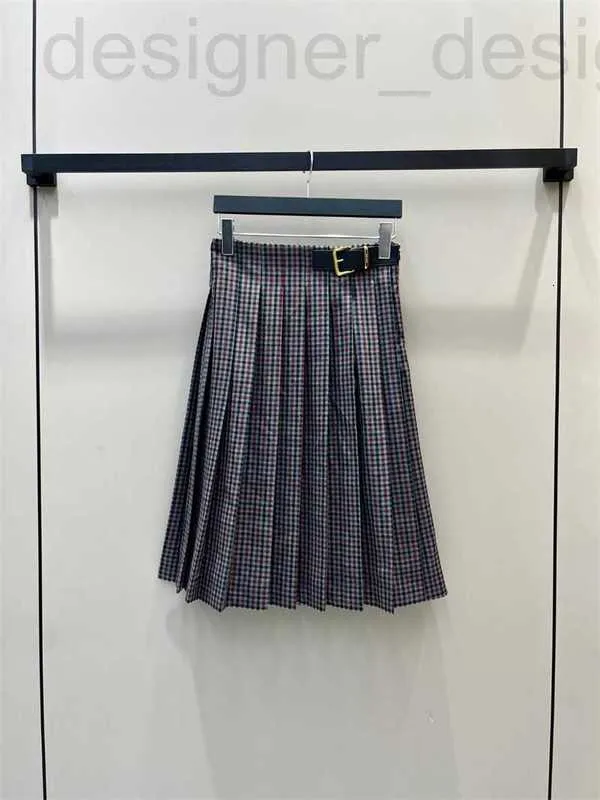 Skirts designer 2023 New Miu Metal Panel Leather Decoration Color Checker Pleated Wool Mid length Half Skirt Women HJE8