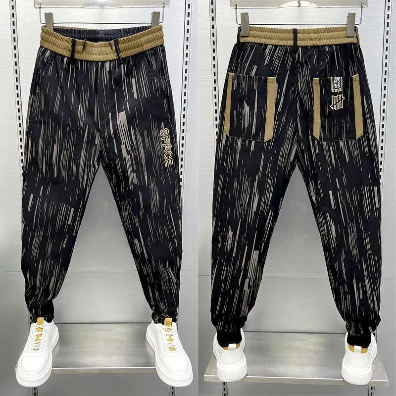 Męskie spodnie moda mężczyźni harem w paski Hip Hop Streetwear Wysokiej jakości Unikalne elastyczne talii męskie spodnie bawełniane joggery dresowe