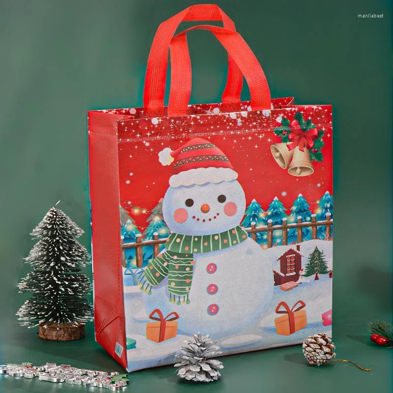 Décorations de Noël 1pcs sacs cadeaux dessin animé mignon Santa Elk bonhomme de neige impression sac à main non tissé décoration de fête sac de rangement