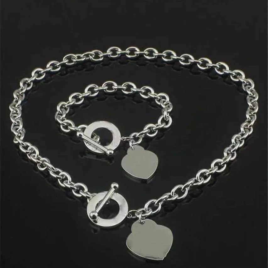 Modedesigner kvinnor halsband armband klassisk hjärtuppsättning 18k guldkedjor för dam kvinnor fest bröllopälskare gåva smycken med 285u