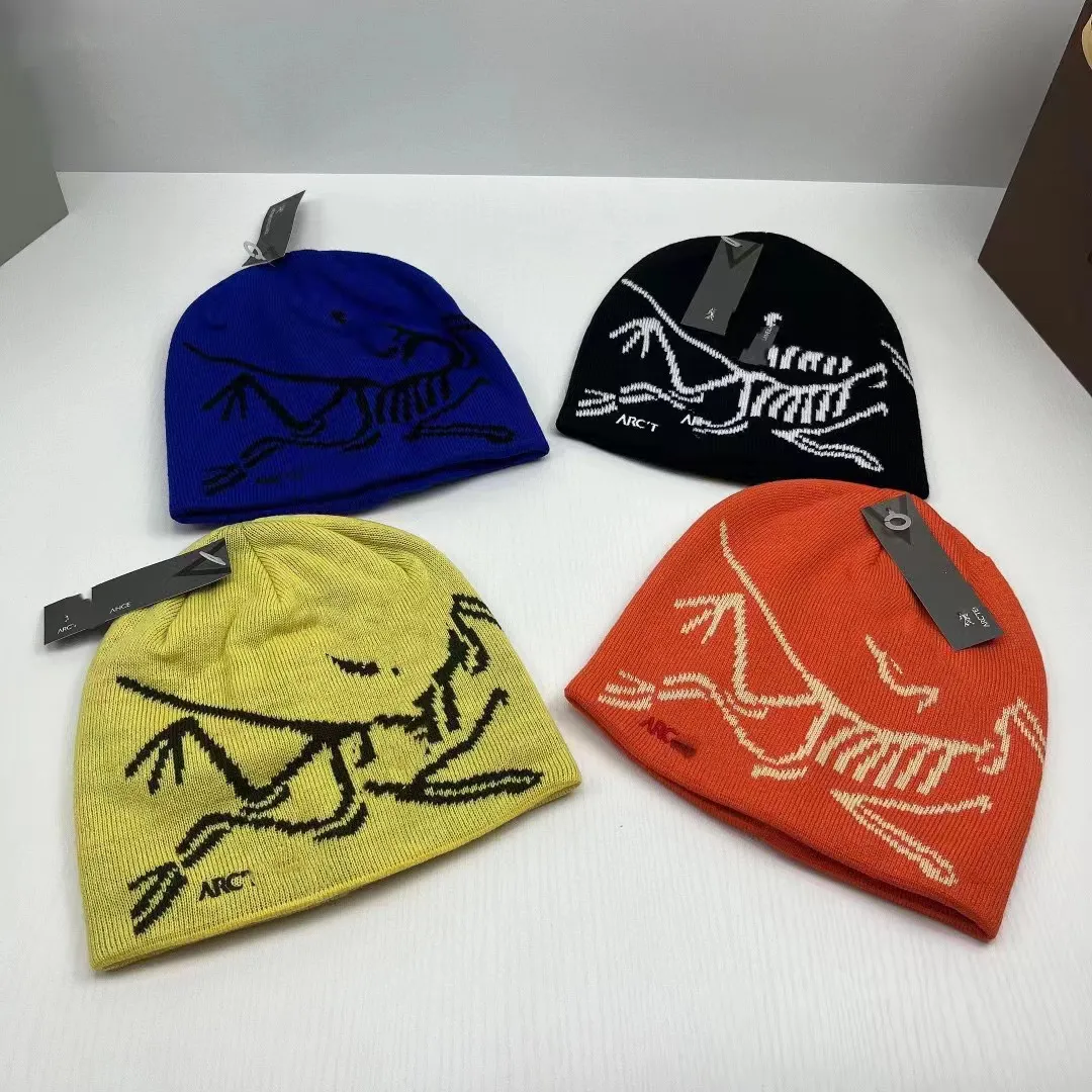 Casquettes de boule automne/hiver chapeau tricoté grande marque bonnet/casquettes de crâne chapeau empilé Baotou lettre côtelé laine triomphe chapeau