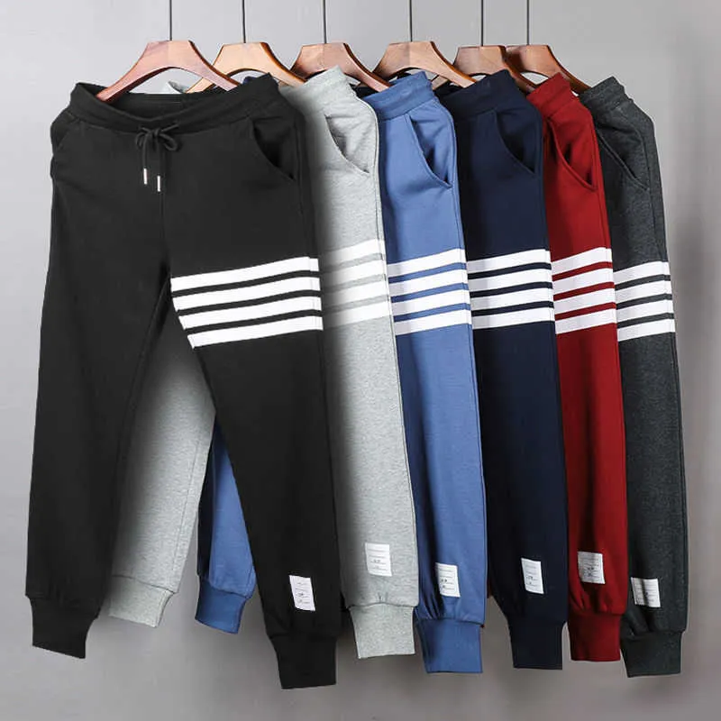 yarn-dyed four bar men's and women's striped pure cotton small foot guard pants sports and leisure youth trend brand leggings trend