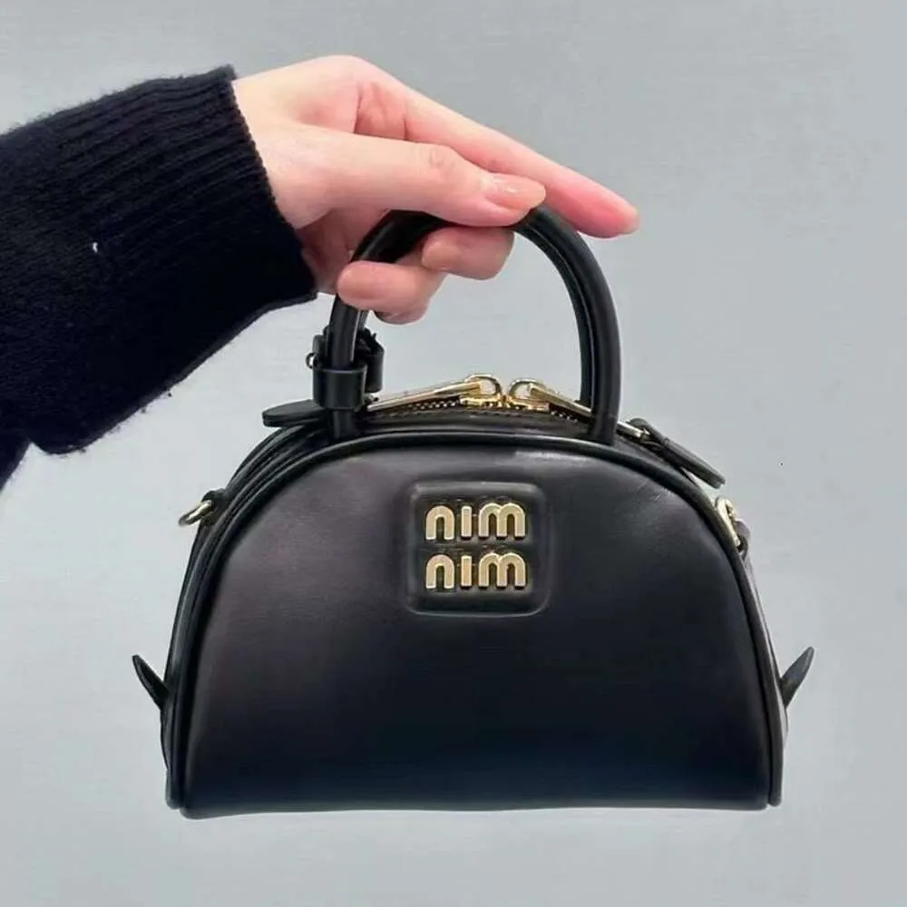 楽一番7220522 DHgate.com:Exquisite Round Leather Handbag: Premium Womens
