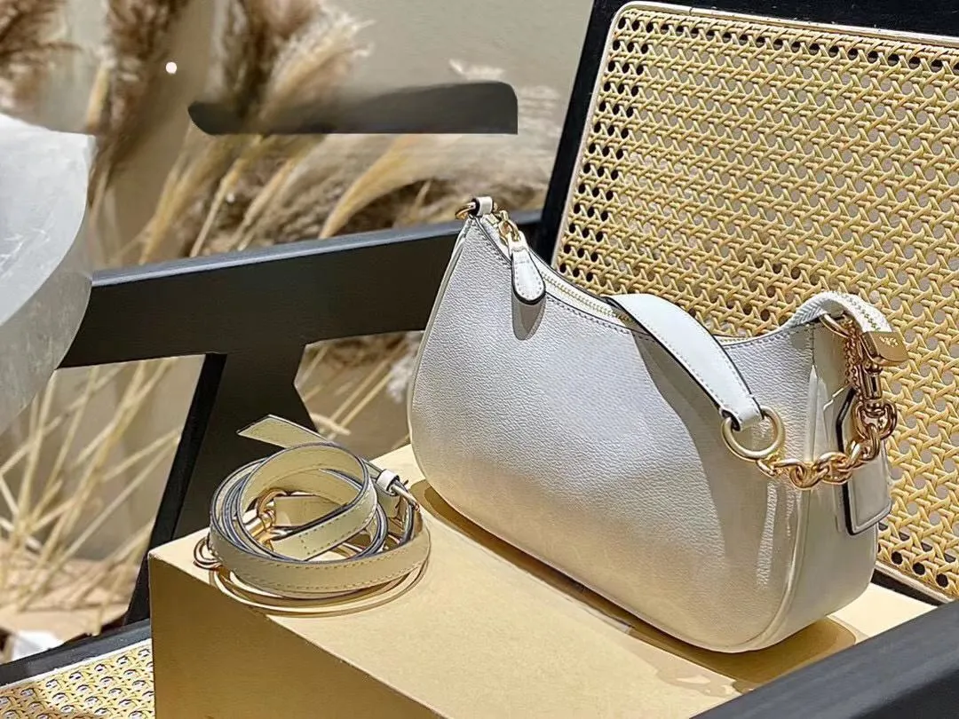 Sacs de créateurs femme Sac à main à bandoulière Hobo Sac de luxe en cuir de veau Sac de lune de haute qualité Plusieurs couleurs Rose Blanc Beige Sac à chaîne pour dames Shopping Sac à bandoulière