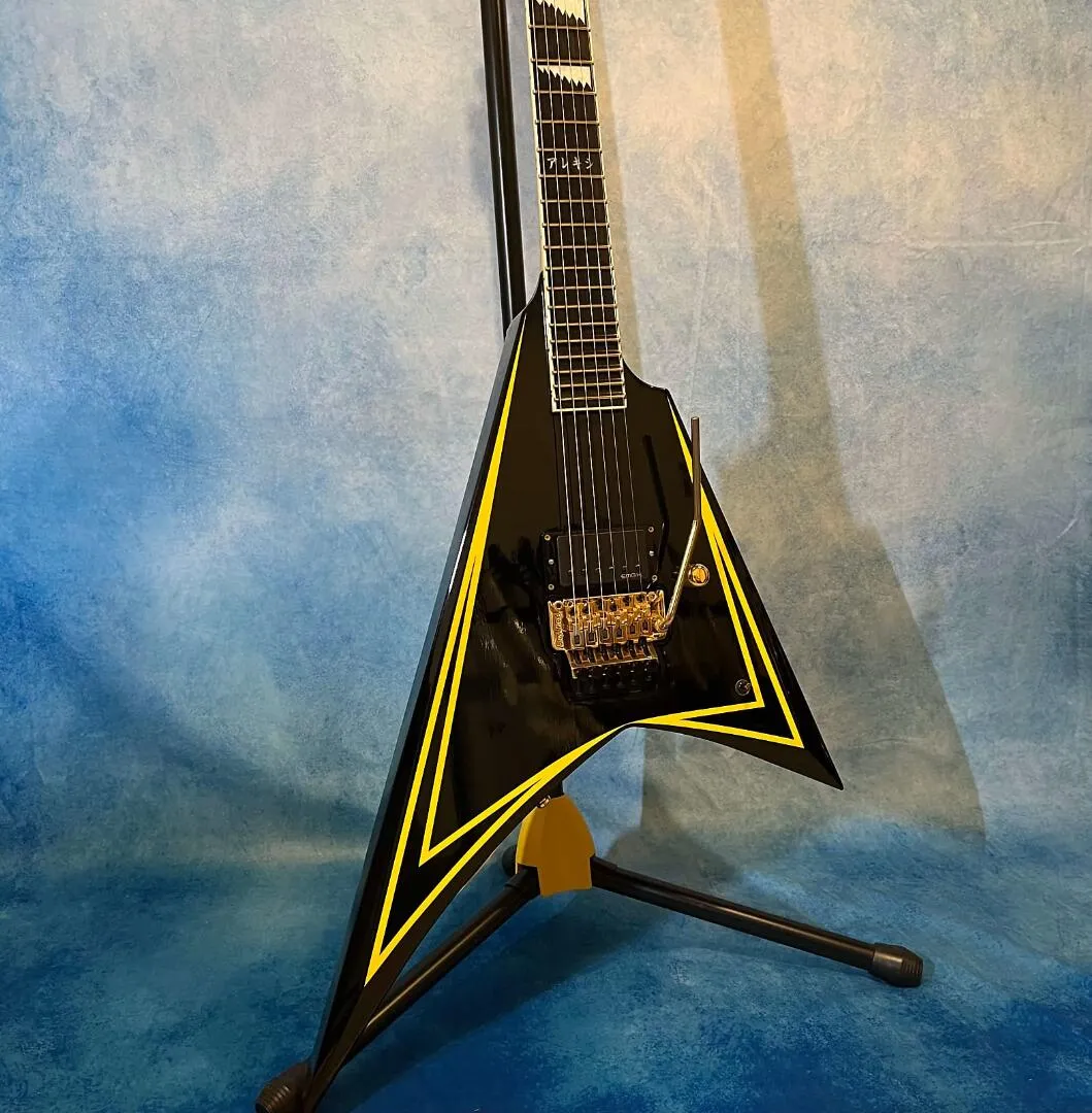Alexi Laiho – guitare électrique à rayures noires et jaunes, pont Tremolo Floyd Rose, micro EMG chinois, incrustation Sharkfin, matériel doré