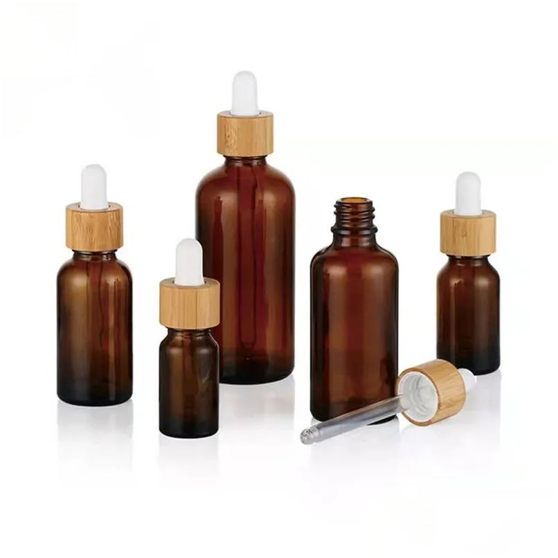 Förpackningsflaskor frostat glas droppflaska eterisk olja med öga och bambu lock per provflaskor essens flytande kosmetisk drop de dhapj