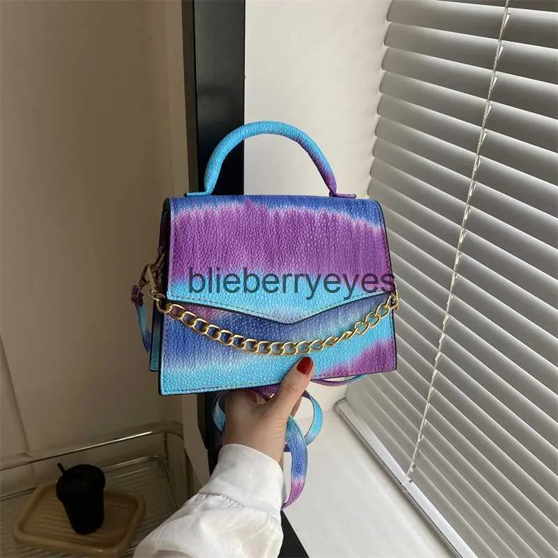 Axelväskor färg stor kapacitet mode handväska kedja dekoration väska kvinnor 2023 sommar ny western stil crossbody bagblieberryeyes