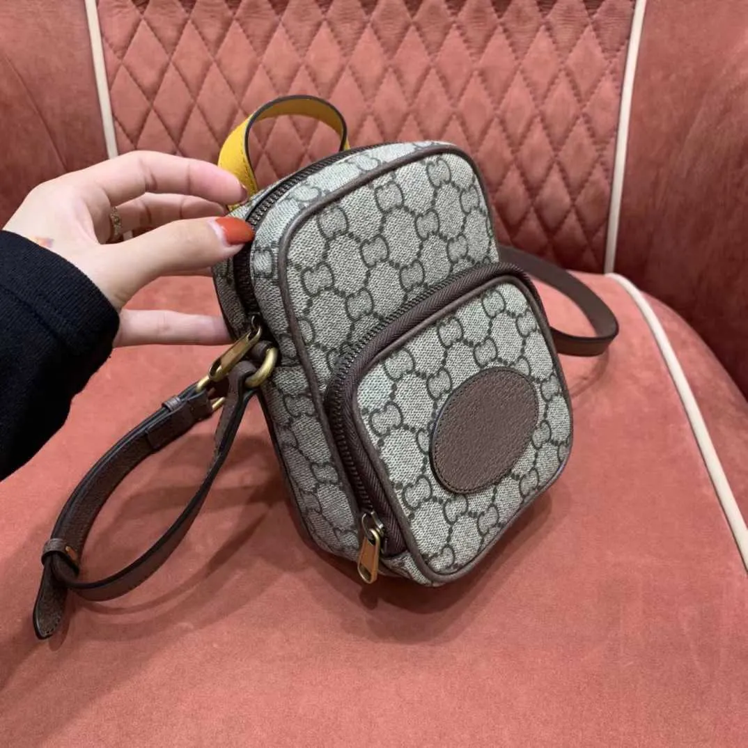 Couro genuíno cabeça de tigre telefone móvel crossbody pequeno 2023 novo verão popular mini ombro versátil bolsa feminina