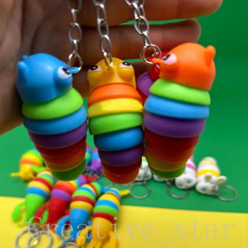 Slug Fidget Toys Keychain Articulated Telescopic Rainbow Caterpillar Sensory Toys for Kids and Adults utövar handledsstyrka och lindra stressleksaker