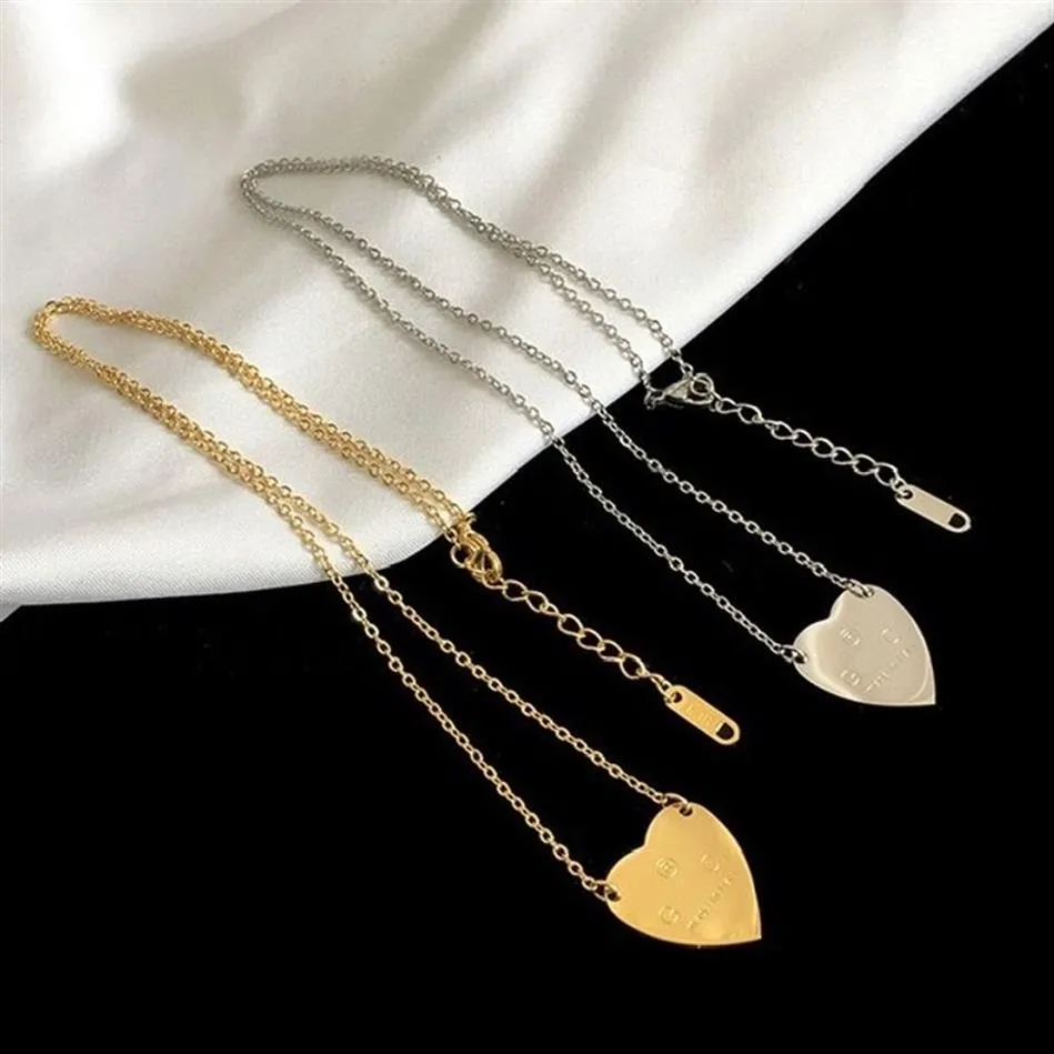 Lyxdesigner smycken kvinnor halsband hjärthänge halsband med brev stämpel silver guldörhängen kostymer rostfritt stål materi314n