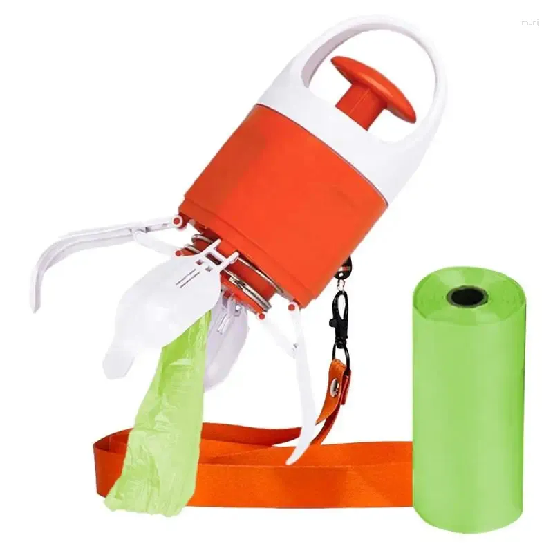 Scooper de merde de griffe de vêtements de chien tenu dans la main avec le distributeur de sac pliable portatif de merde d'animal de compagnie pour le cueilleur de ramassage de cour