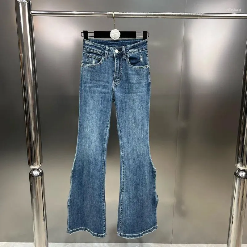 Kvinnors jeans zcsmll 2023 vårinter vinter Denim byxa ben drar något ut oregelbundet visar europeiska amerikanska tröja kvinnor