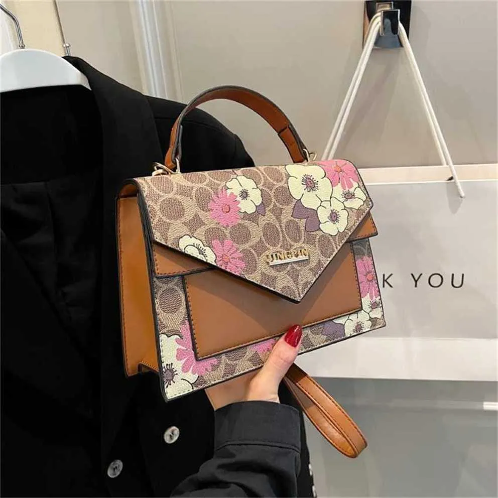 Outlet barato 50% de desconto Bolsas para mulheres com uma sensação sofisticada nova e versátil bolsa crossbody de um ombro leve bolsa de estilo estrangeiro de luxo mochila feminina