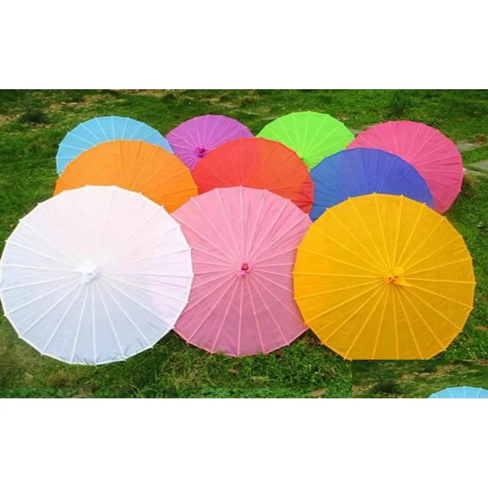 Paraplyer kinesiska färgade paraply vita rosa parasoler porslin traditionell dansfärg parasol japansk siden bröllop rekvisita6559729 drop dh3ks