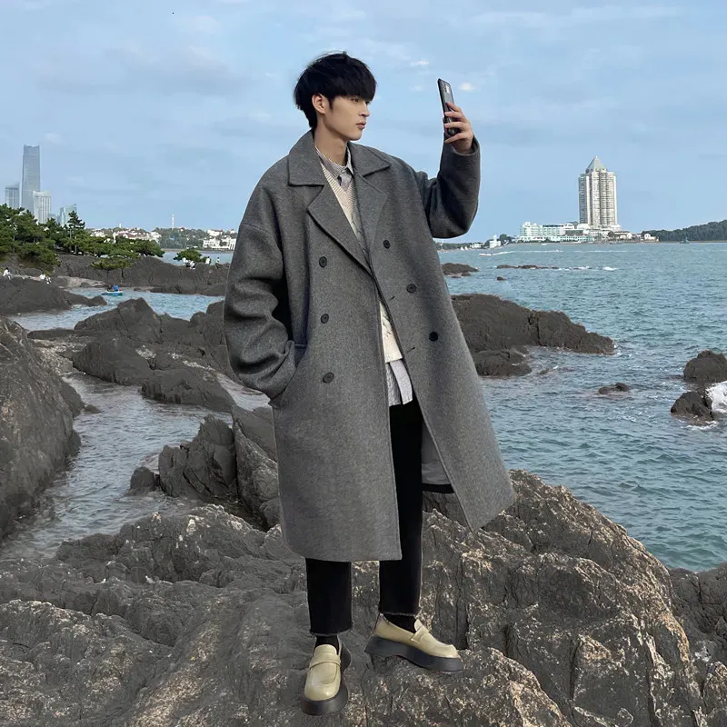 Cappotto lungo in misto lana da uomo Cappotto invernale da uomo in stile coreano Trench da uomo Solido doppio petto Cappotto in panno di lana Trench casual allentato Outwear 231016