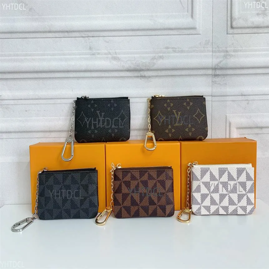 2023 Sac de rangement de clé de monnaie avec chaîne Femmes Mini Porte-monnaie Designer de luxe en cuir à carreaux Petit portefeuille à glissière Dames Porte-clés Trend2476