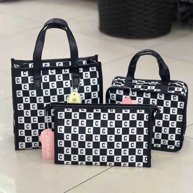 Borse per cosmetici Custodie Fog Flower Nuova versione borsa da donna per mamma per pendolari da lavoro per lavaggio cosmetico portatile con lettera semplice