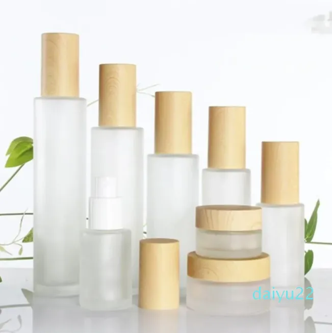 Partihandel Frosted Glass Cosmetic Jar Bottle Face Cream Pot Lotion Spray Pump flaskor med plastimitation Bambu lock