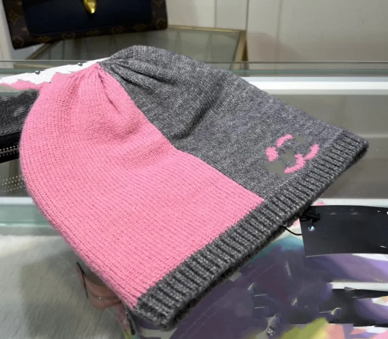 Automne et hiver nouvelle couleur correspondant casquette en laine femmes décontracté cent lumière luxe tricoté chapeau chaud haute sens bonnet chapeaux