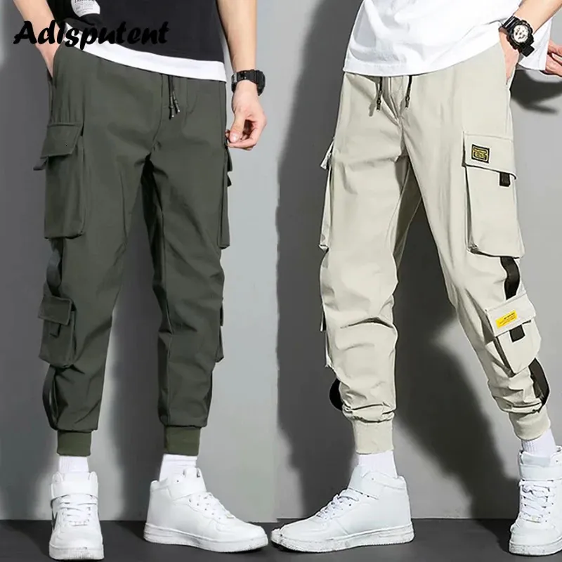 Pantaloni da uomo Pantaloni Hip Hop Pantaloni cargo Pantaloni Harem da uomo Nastri multitasche Pantaloni sportivi da uomo Streetwear Pantaloni casual Pantaloni sportivi da uomo 231017