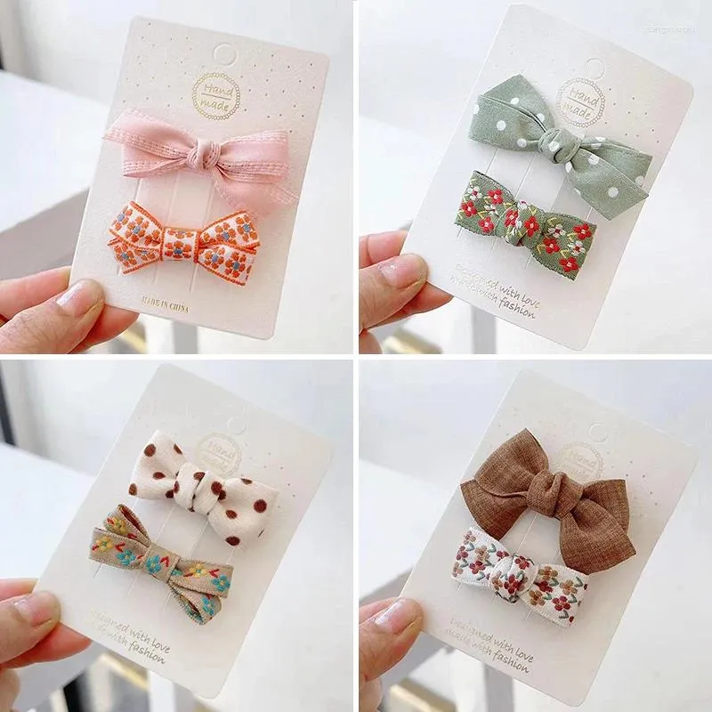 Hårtillbehör 2st/set söta bågar baby flicka klipp fast färg randig blommig bowknot hårnålar Barrettes