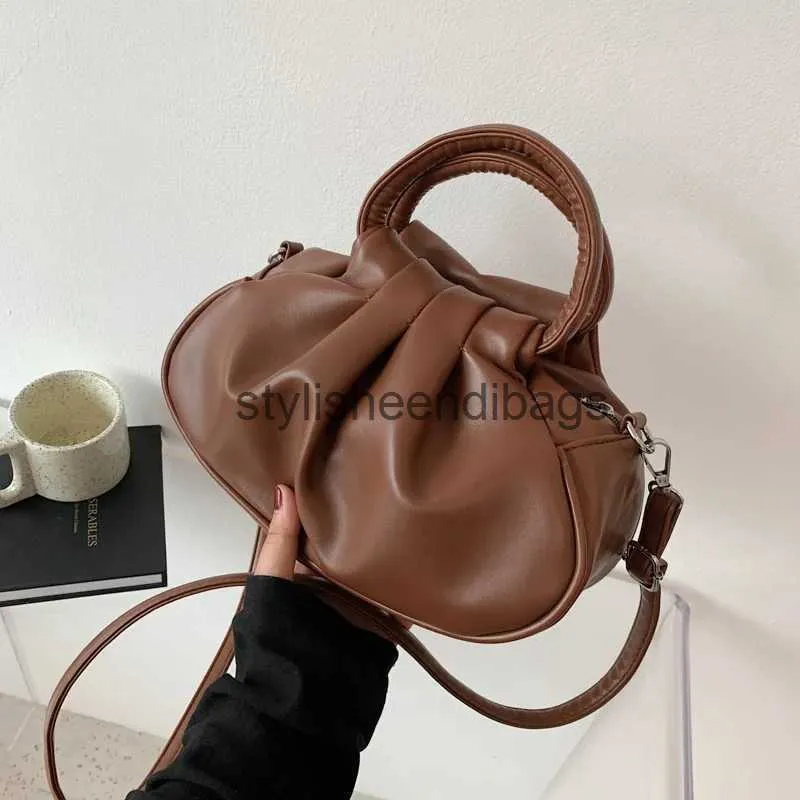 Borsa per il corpo incrociato per 2023 Nuove sacchetti di design a pieghe semplici borse a tracolla per teatro femmina Ladies Capacità mini Handbagstylisheendibags