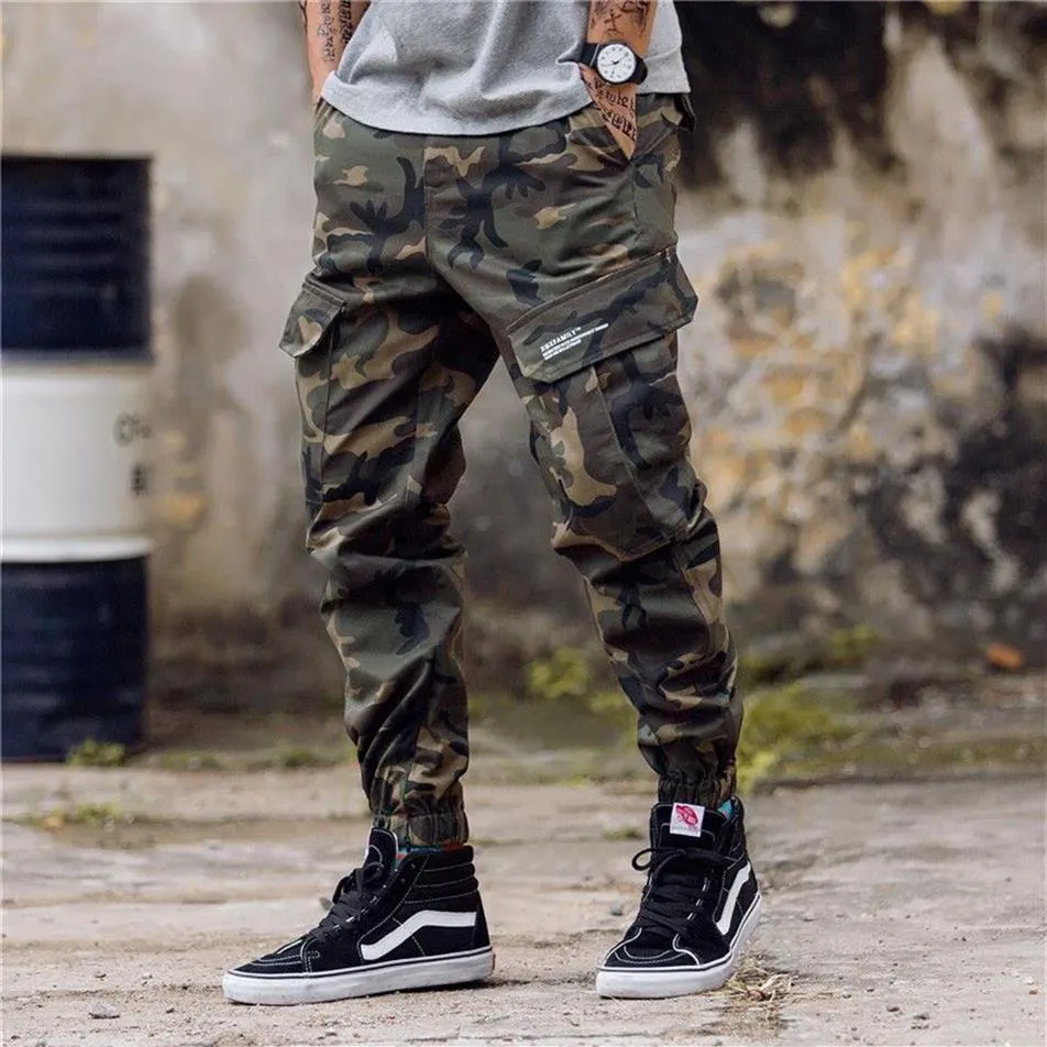 E-BAIHUI moda masculina camuflagem calças de jogging com zíper macacão feixe pé calças irregulares hip hop designer masculino jumm313m